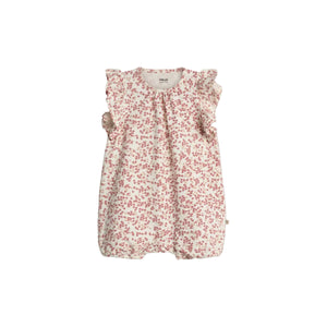A white baby romper decorated with a pink strawberry pattern, featuring ruffled sleeves. The label reads "PURE.LUX ORGANIC COTTON," suggesting an emphasis on organic materials.