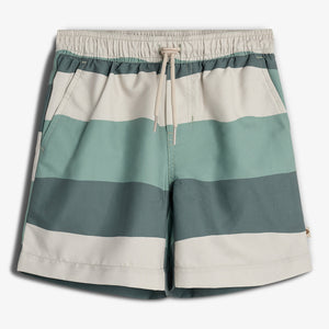 Striped swim shorts feature horizontal bands in teal, light green, and cream. They have an elastic waistband with a drawstring, creating a casual look against a white background.