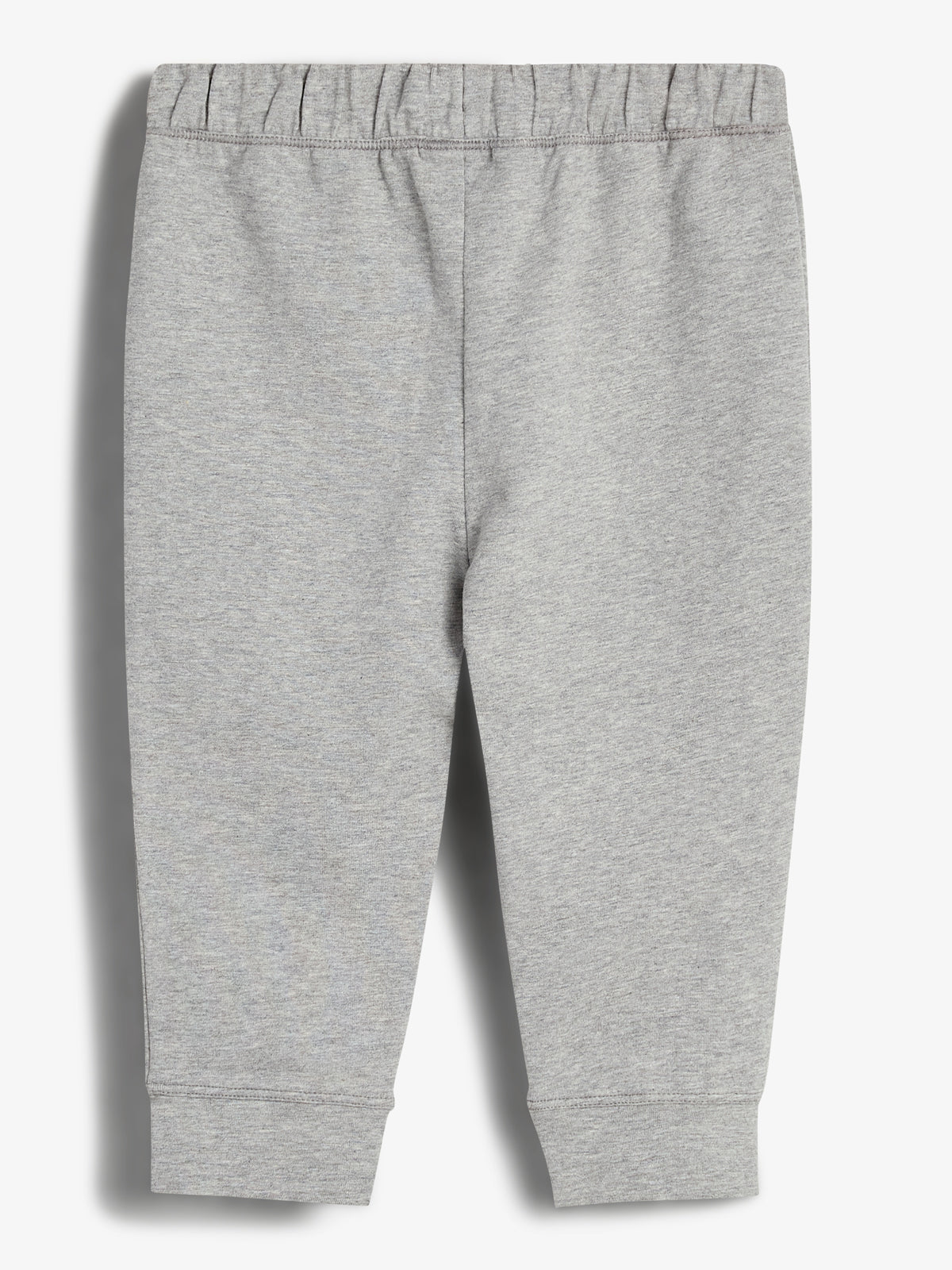 Graue Jogginghose liegt flach auf einem weißen Hintergrund. Der elastische Bund und gerade geschnittene Beine betonen ein schlichtes Design für bequeme Freizeitkleidung.