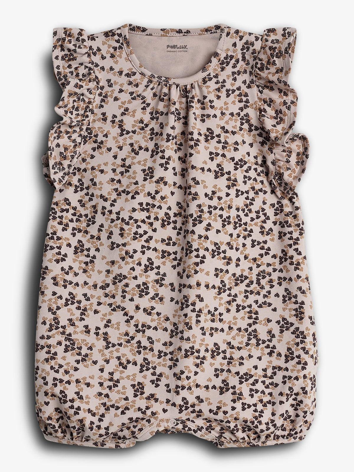 Ein beigefarbener Baby-Strampler mit Rüschenärmeln zeigt ein dichtes Muster aus kleinen, braunen und goldenen Blumen. Der Text "POMP DE LUX ORGANIC COTTON" ist innen sichtbar.