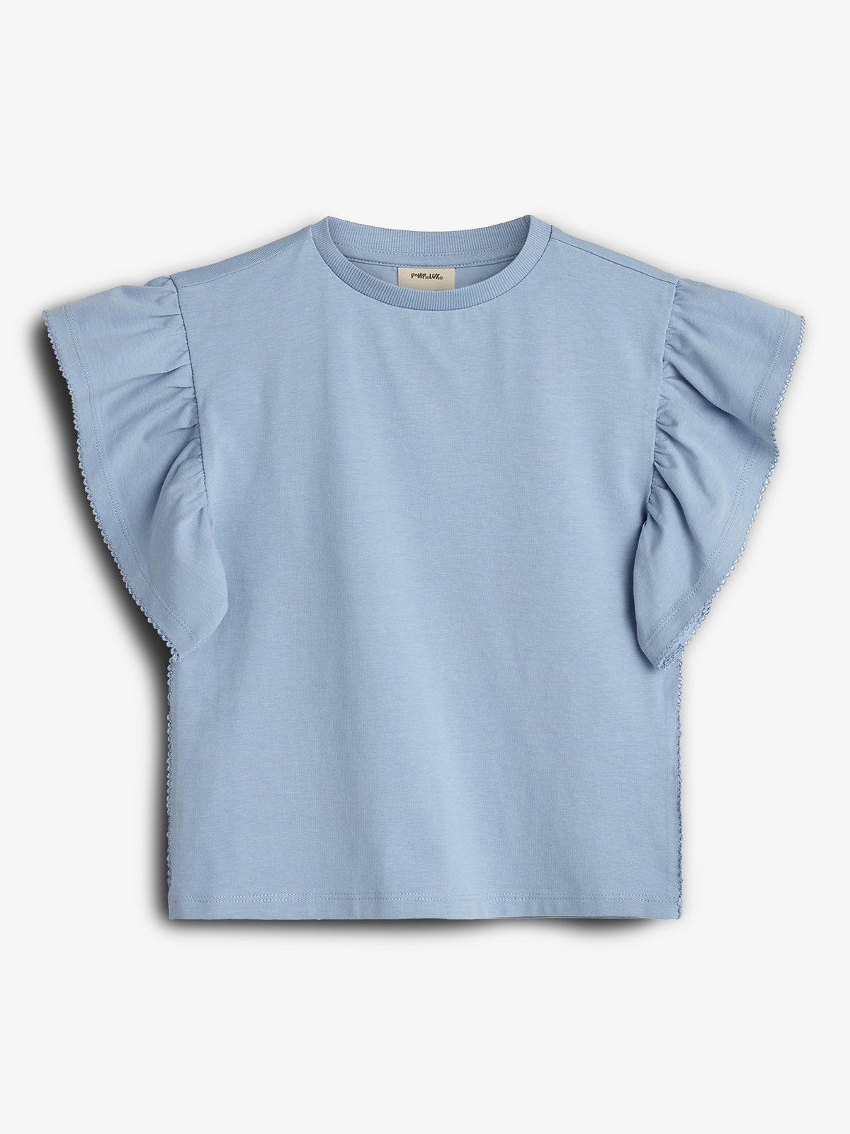 A light blue short-sleeve shirt with ruffled shoulders is displayed on a white background. The label inside reads "Patrizia Pepe." The context is a simple, isolated presentation.