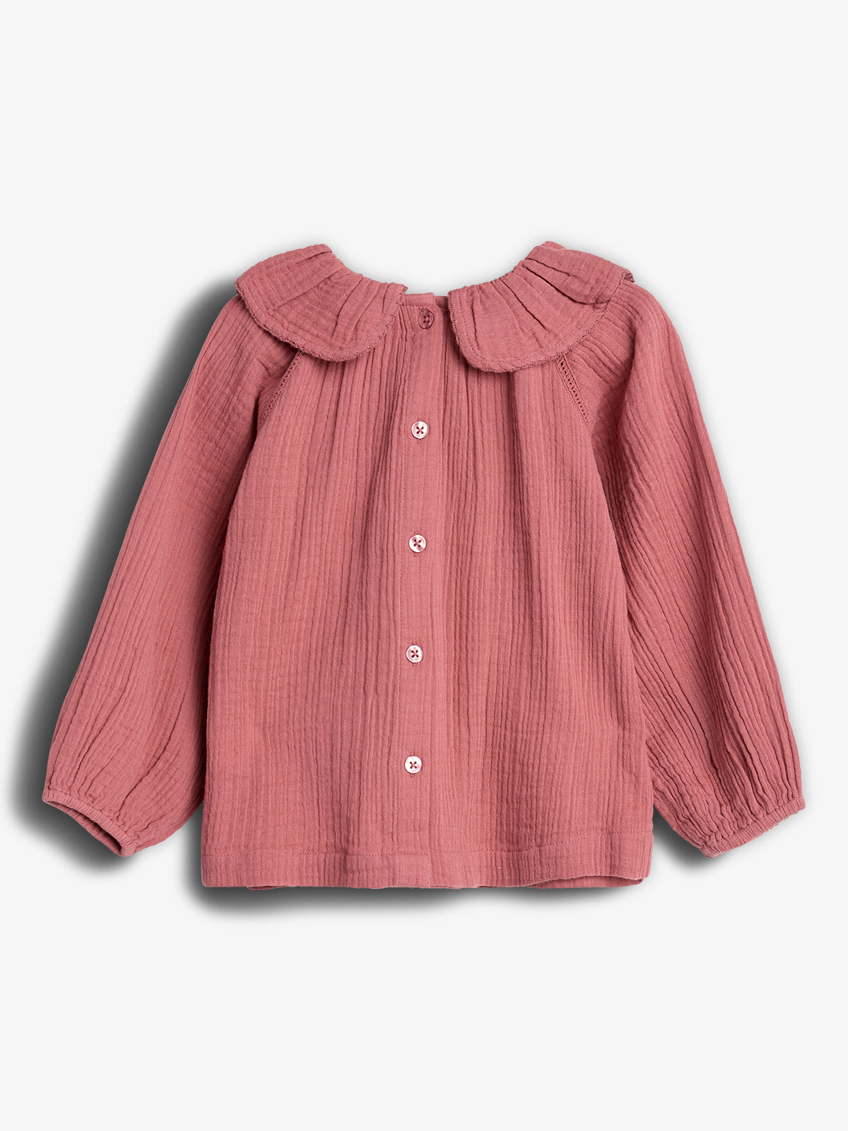 Pink button-up shirt with long sleeves and a pleated collar, displayed flat against a plain white background.